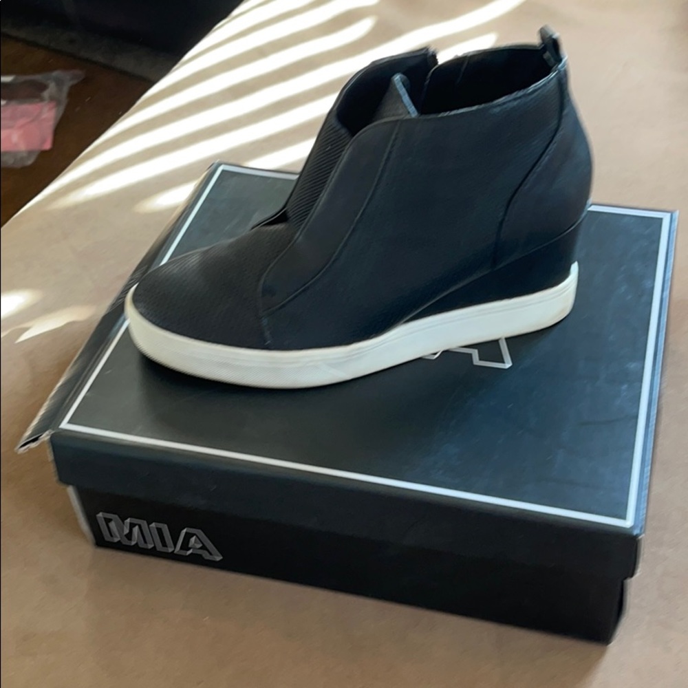 Black MIA wedge Bootie in excellent condition.